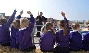 school children hands up